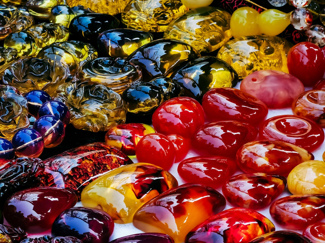 red and gold baubles on yellow and white textile