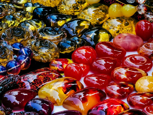 red and gold baubles on yellow and white textile