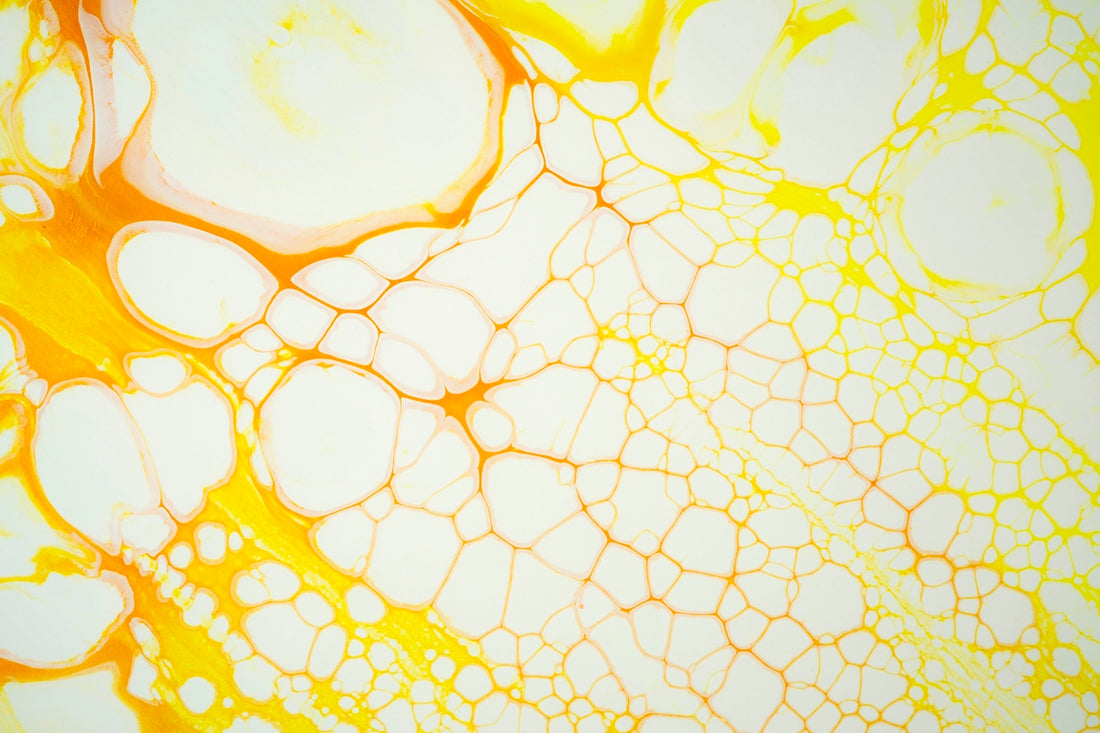 a close up view of a yellow and white substance