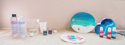 blue and white floral round plate beside white and green plastic bottle