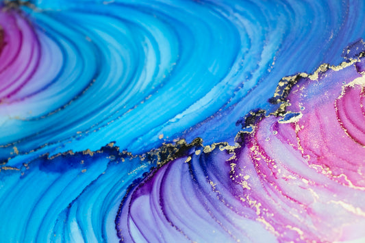 a close up of a blue and purple plate